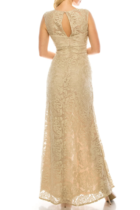 Rear view of a woman wearing a champagne gold lace floor-length evening gown
