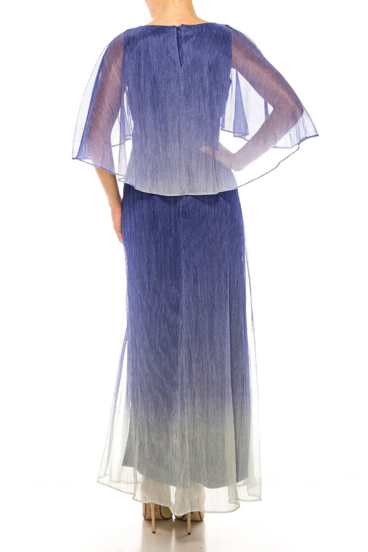 Back view of a woman wearing a blue pleated ombre evening gown with a sheer capelet