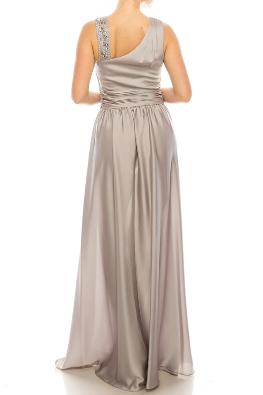 Back view of a silver one-shoulder satin evening gown with embellished strap