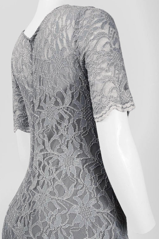 Close-up of a grey floral lace women's evening dress on a mannequin