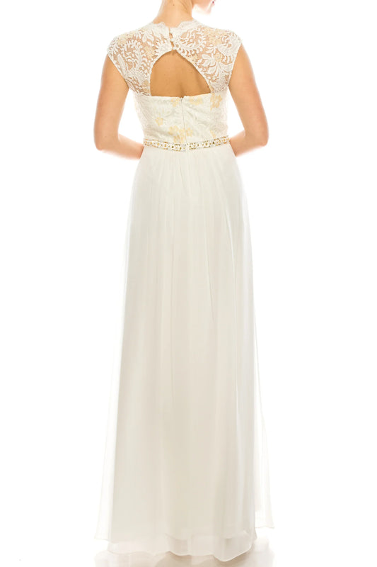 Rear view of a white mother-of-the-bride gown with lace bodice and flowing skirt