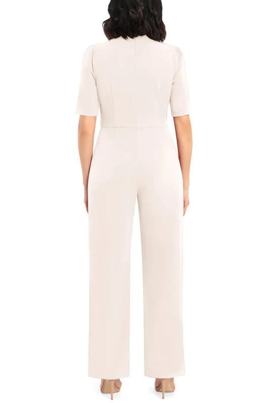Back view of a woman wearing a cream-colored short-sleeve wide-leg jumpsuit