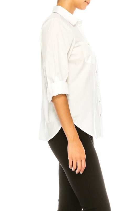 Side view of a woman wearing a white button-down shirt and black trousers