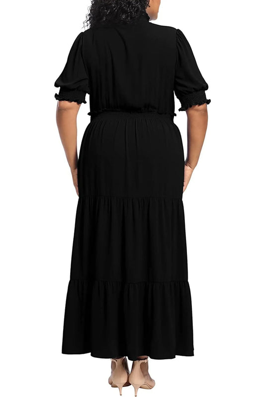 Back view of a woman wearing a black tiered maxi dress with puffed sleeves