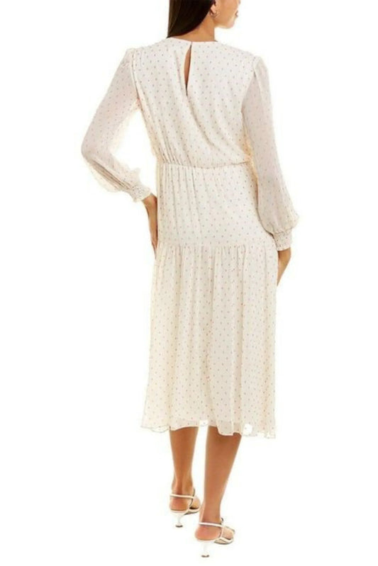 Back view of Maison Tara white dot texture print long sleeve tiered maxi dress