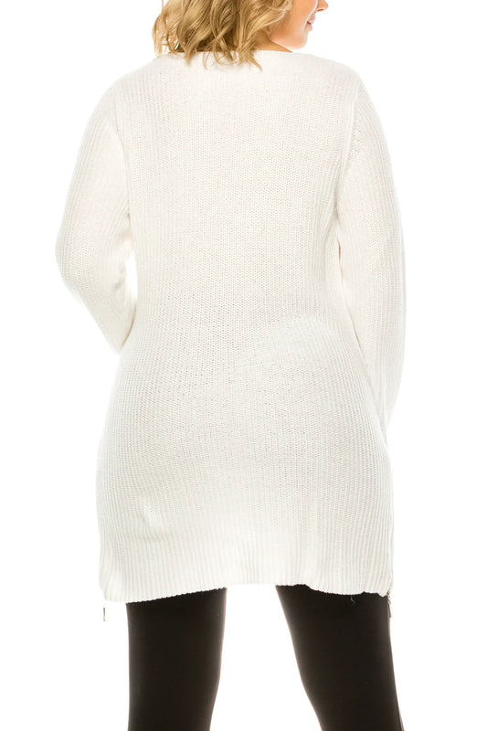 Back view of a woman wearing a NYGARD white long sleeve knit tunic.