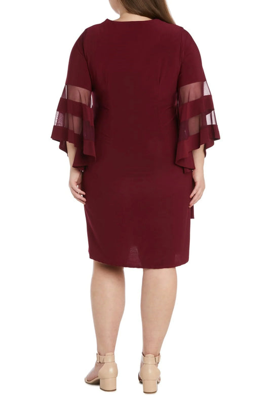 Back view of a woman wearing a burgundy knee-length dress with sheer striped bell sleeves.