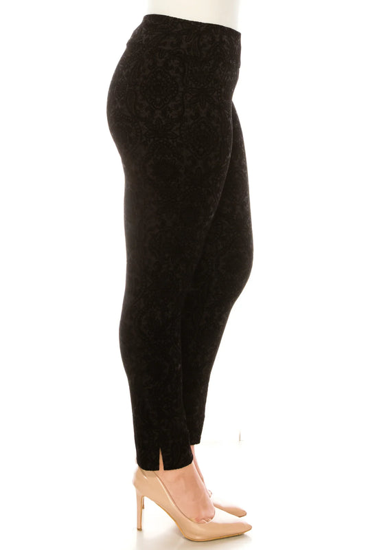 Woman wearing black patterned leggings and beige pointed-toe high heels