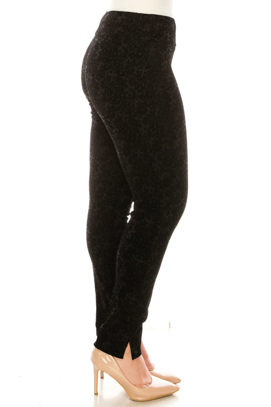 Women's black floral jacquard slim-fit trousers with ankle slits and beige heels