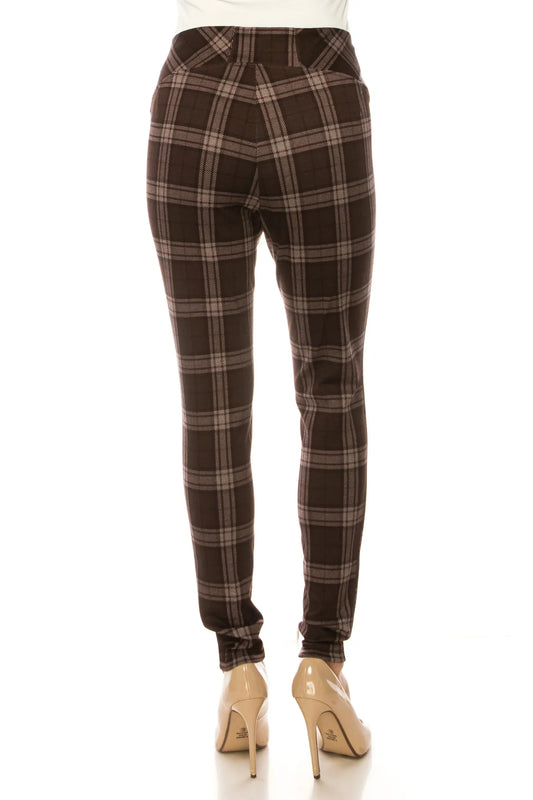 Back view of women's brown plaid slim-fit trousers and beige high heels