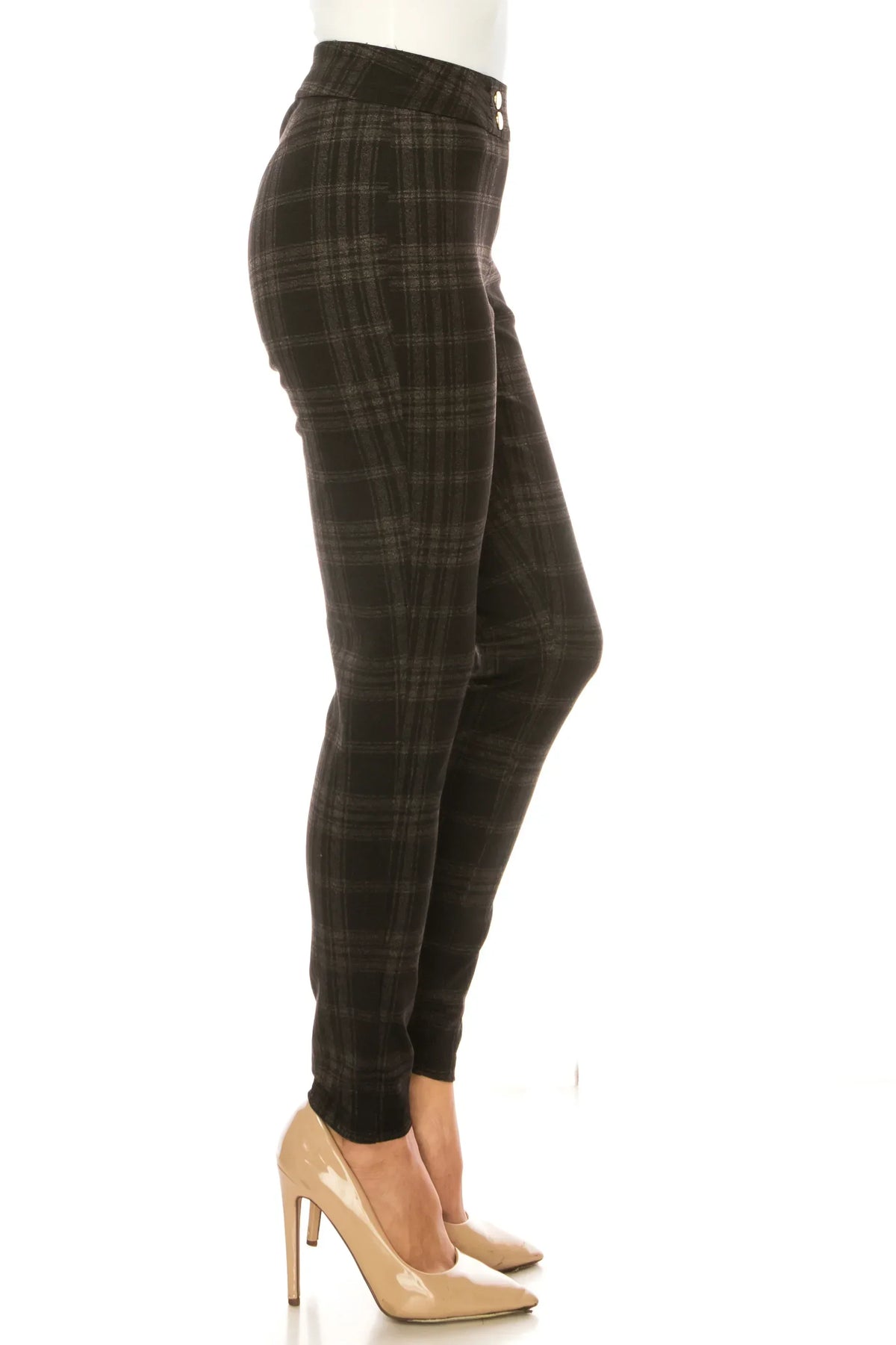Woman wearing dark grey plaid skinny trousers and nude high heel pumps