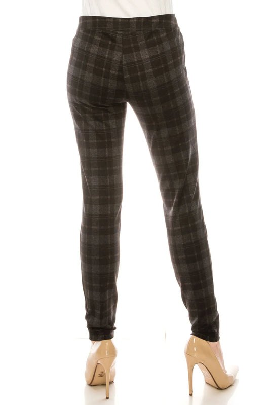 Rear view of women's charcoal grey plaid skinny pants paired with beige high heels