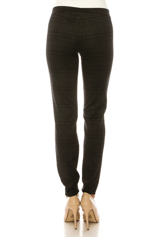 Back view of women's charcoal grey plaid slim-fit trousers with nude pointed-toe heels.